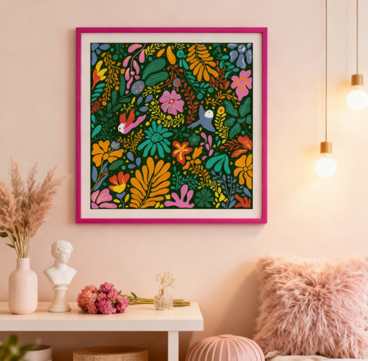 Colorful floral artwork in a pink frame on a wall with decorative items below.