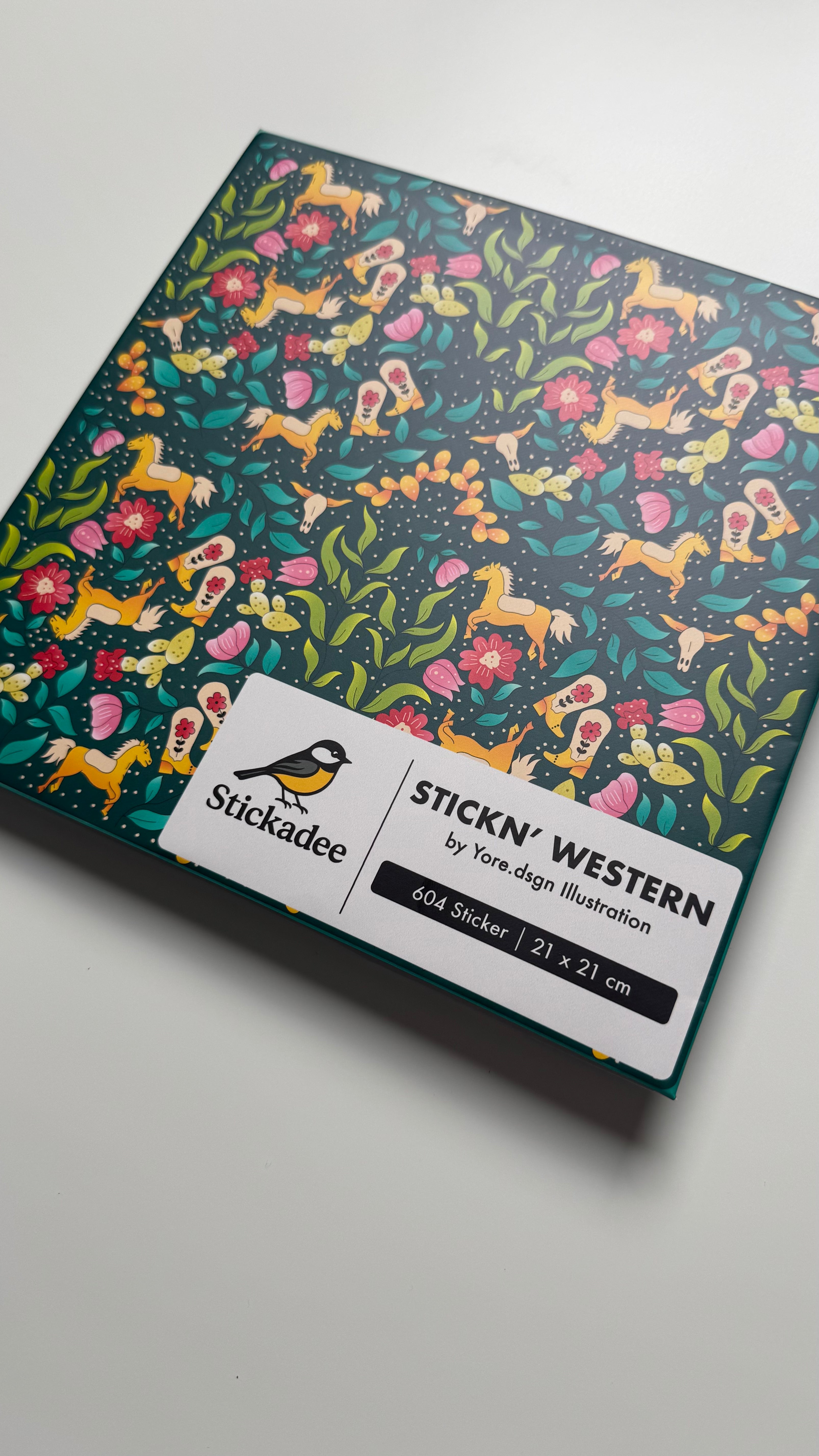 Sticker book with colorful western design on a white background
