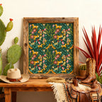 Decorative framed artwork with a cowboy hat, boots, and cacti in a rustic setting.